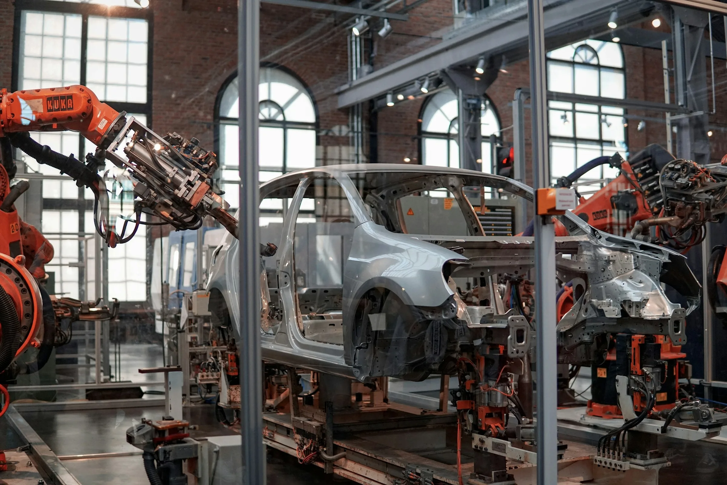 Automotive body-in-white assembly line with robotic welding cells