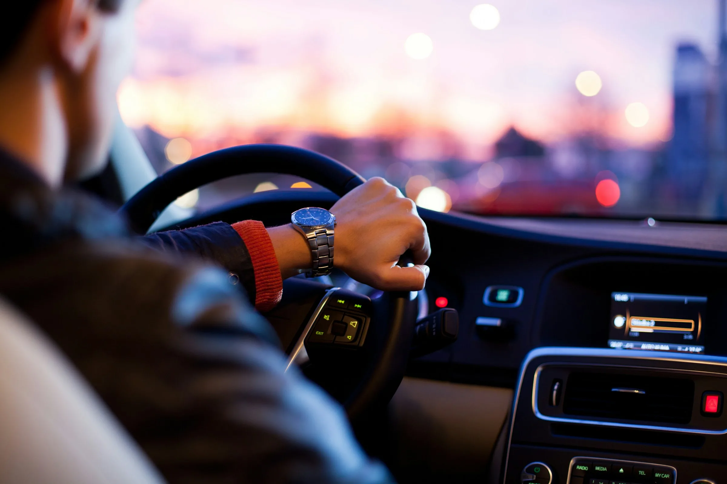Driver at the wheel of a vehicle