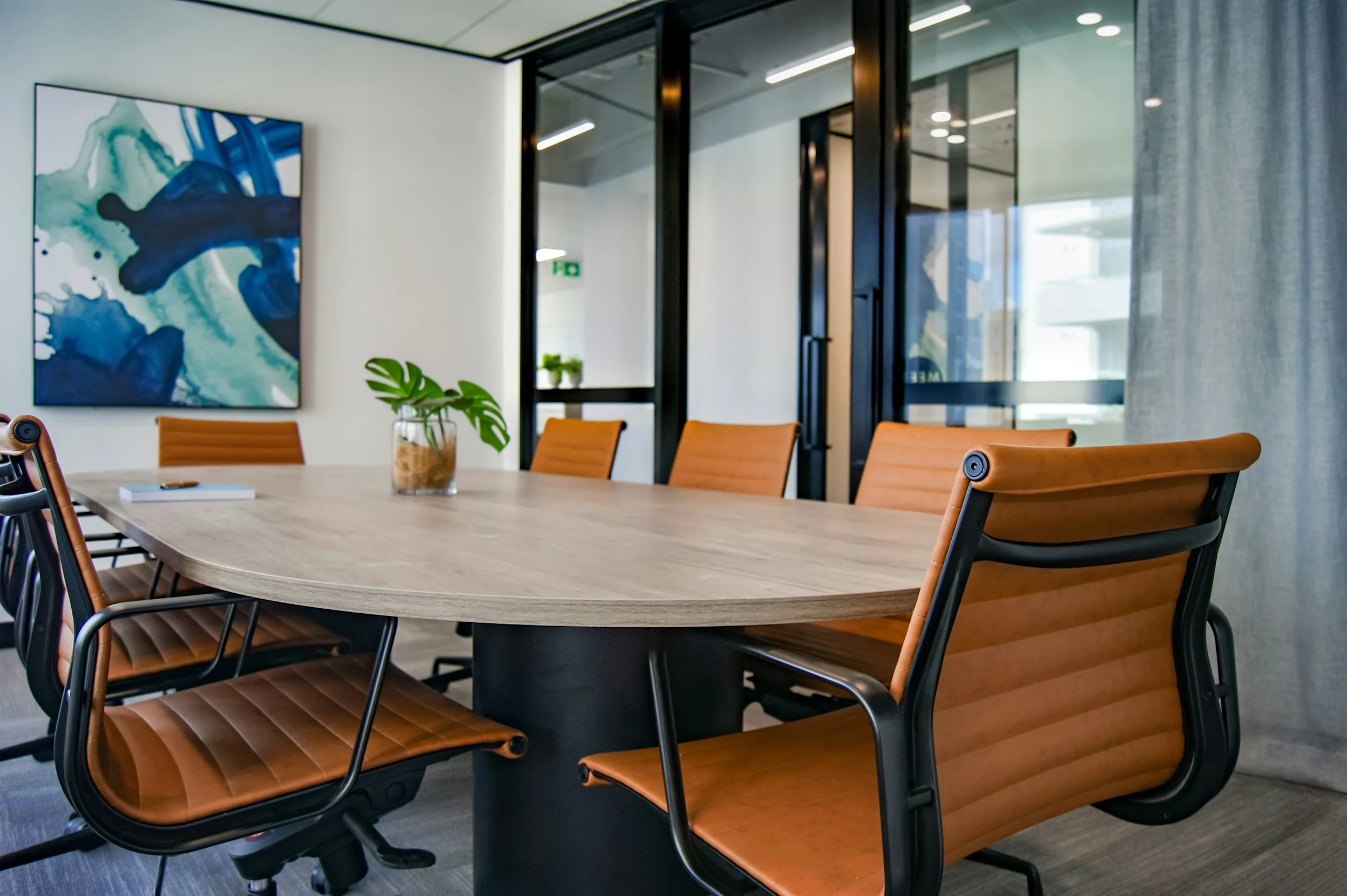 Boardroom with meeting table and chairs