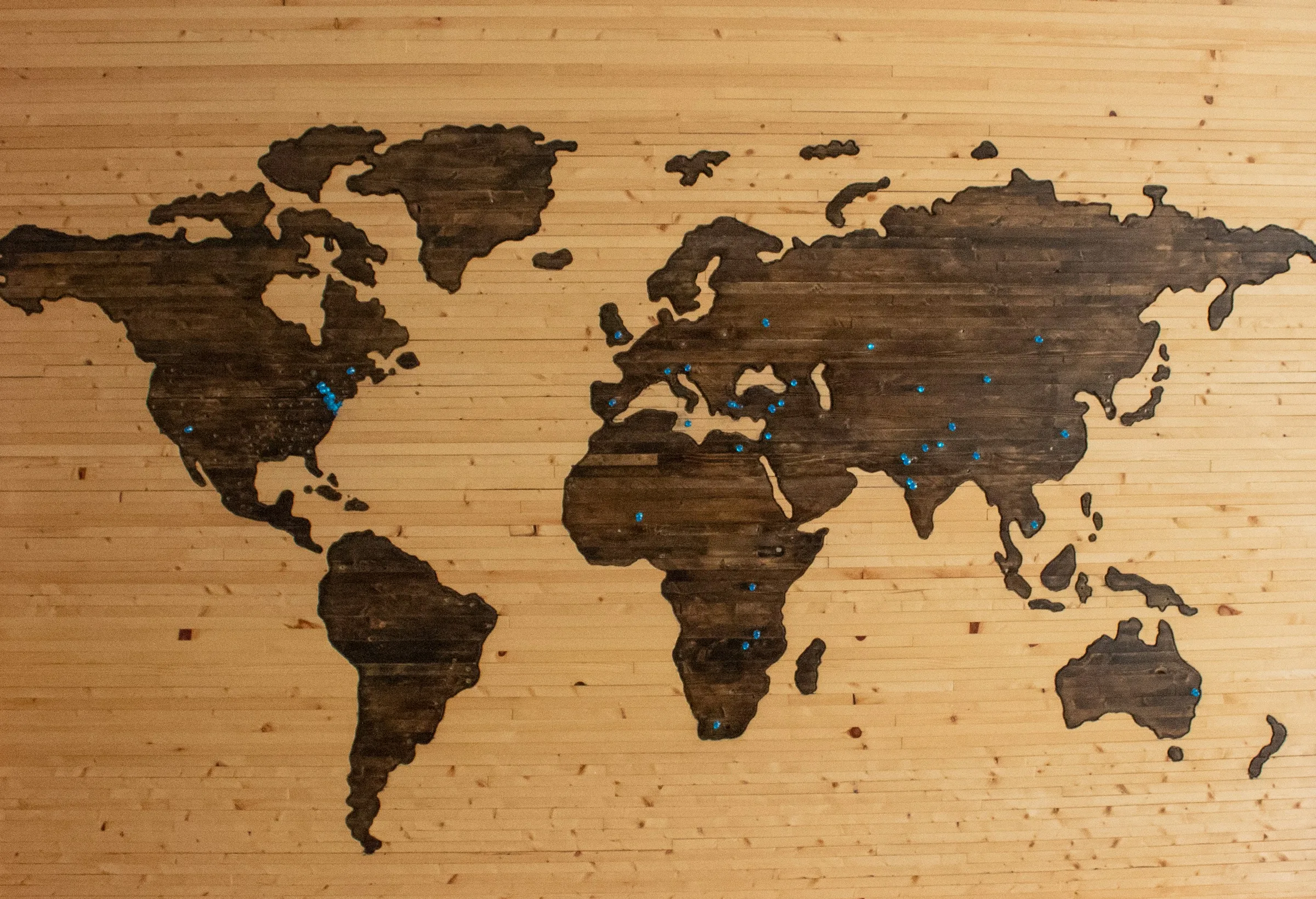 World map with pins marking international markets